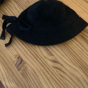 Hat- cute black hat with a bow. Perfect to complete any outfit!New and no flaws.